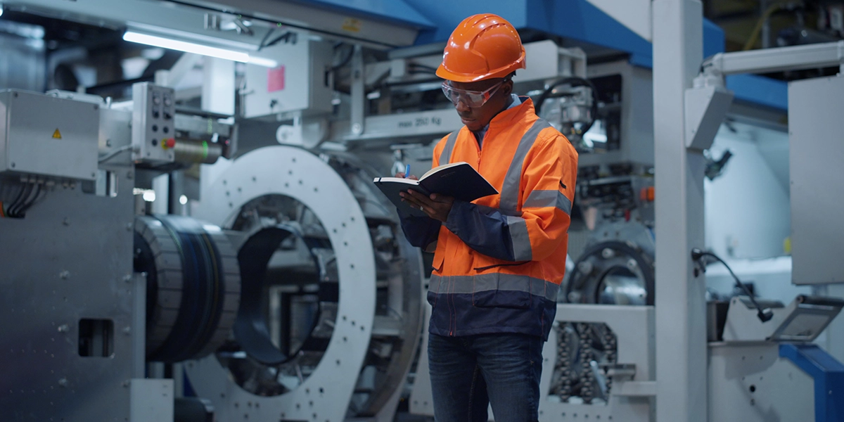 Technician references technical writing for a repair